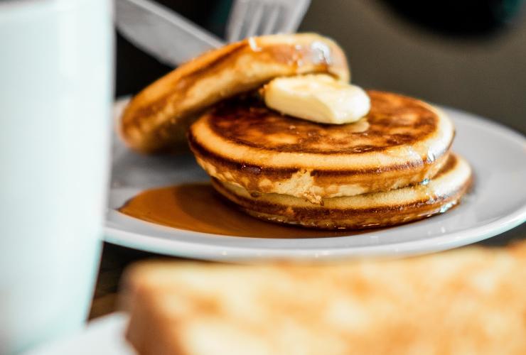 A stack of buttery pancakes.